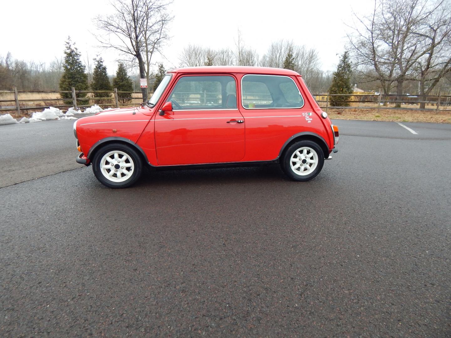 1981 RED /Black Cloth Austin Mini Cooper (AA25AU11248) with an 1275 CC engine, 4 speed manual transmission, located at 6528 Lower York Road, New Hope, PA, 18938, (215) 862-9555, 40.358707, -74.977882 - Very cool, great driving 1981 Austin Mini-Cooper. We believe it is a 1981 due to the rear taillights. The title shows it as a 1969 model year, however the cars built in the 1960s had outside door hinges. Also , the windows were sliding instead of the roll up windows this vehicle has.. Red/ whit - Photo#1